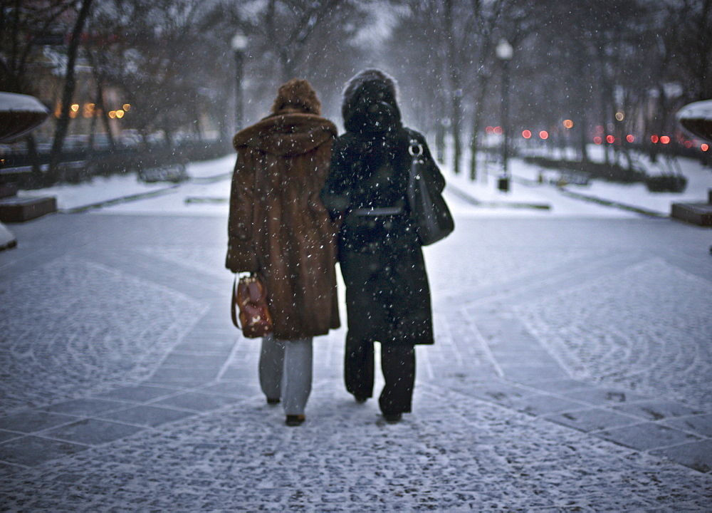 Two women in the snow, Moscow, Russia, Europe