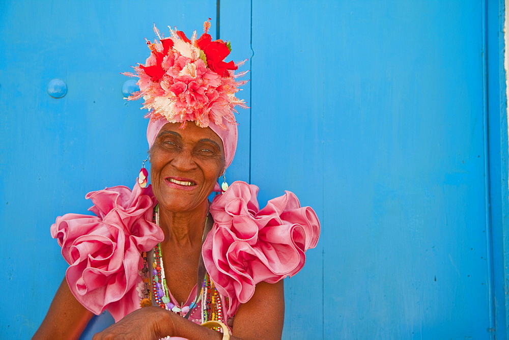 Cuban woman dressed as showgirl, Havana, Cuba, West Indies, Central America