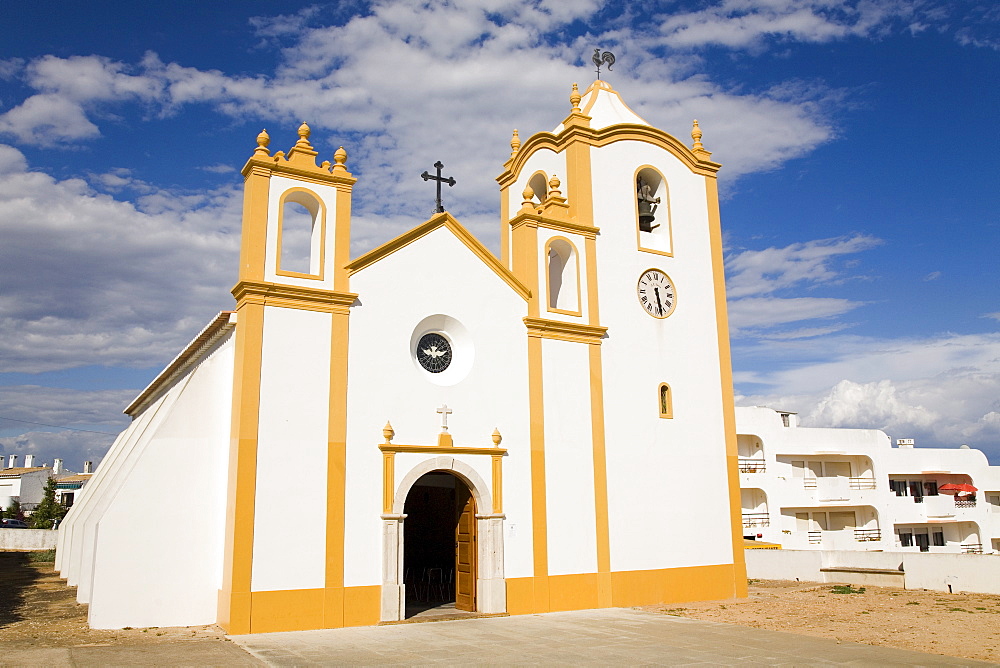 The typically Portuguese white facade of the Nossa Senhora da Luz chuch in Lagos, Algarve, Portugal, Europe