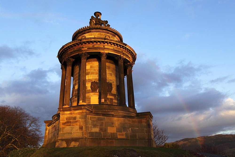 A rainbow curves over the Burns Memorial, dedicated to national poet Robbie Burns, Edinburgh, Scotland, United Kingdom, Europe