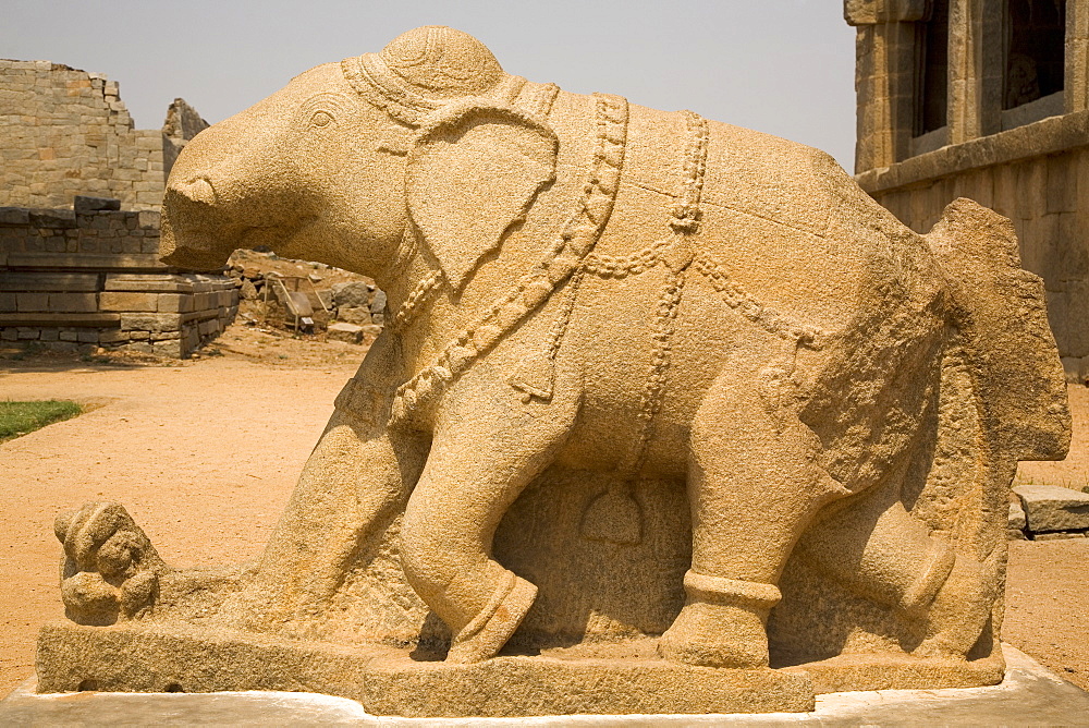 An elephant sculpture, with a broken trunk, adorns the royal Elephant Stables at Hampi, UNESCO World Heritage Site, Karnataka, India, Asia