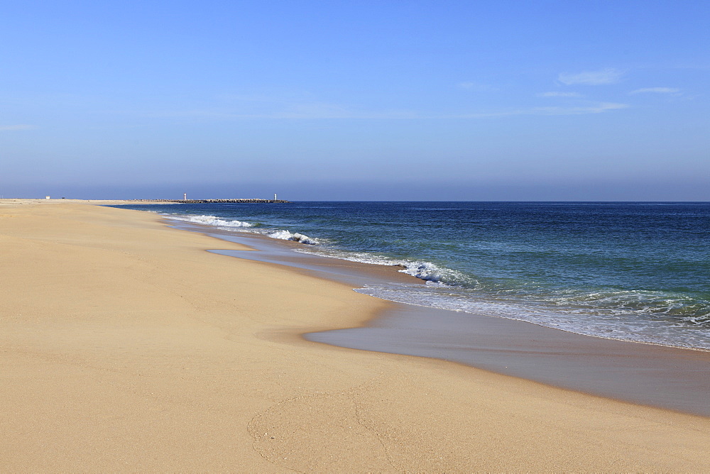 The golden sands of a beach on Ilha Deserta (Barreta), an island in the Ria Formosa National Park, Algarve, Portugal, Europe