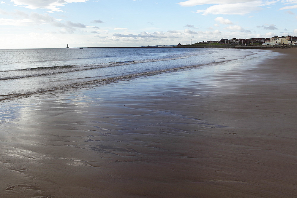 Low tide at Seaburn Beach, Roker Pier is seen in the distance, Sunderland, Tyne and Wear, England, United Kingdom, Europe