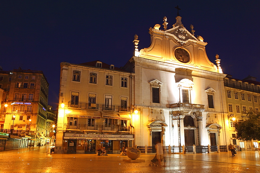 The Baroque style Leitaria Sao Domingos church, illuminated at night, in the Baixa district, Lisbon, Portugal, Europe