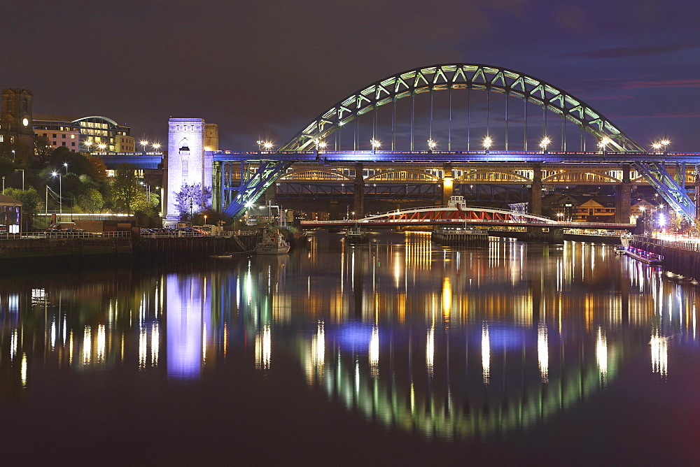 The Tyne Bridge spans the River Tyne, above the Swing Bridge, between Gateshead and Newcastle-upon-Tyne, Tyneside, England, United Kingdom, Europe