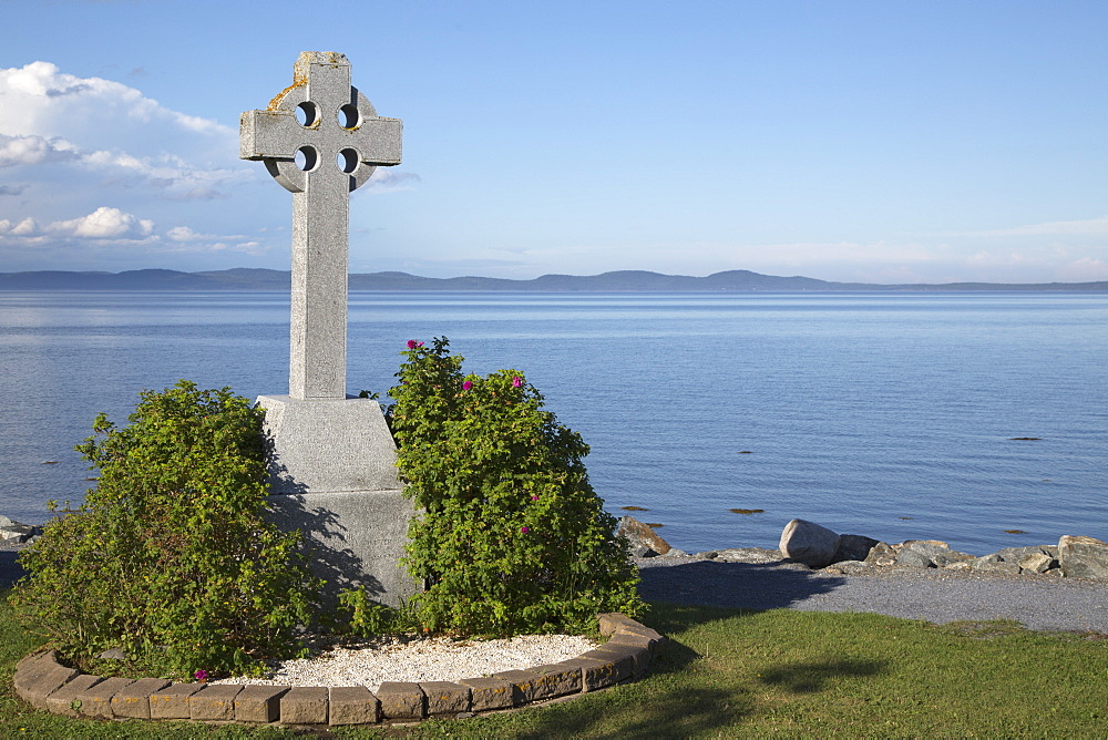 Celtic cross, a stone landmark overlooking Passamaquoddy Bay, at St. Andrews by-the-Sea in New Brunswick, Canada, North America