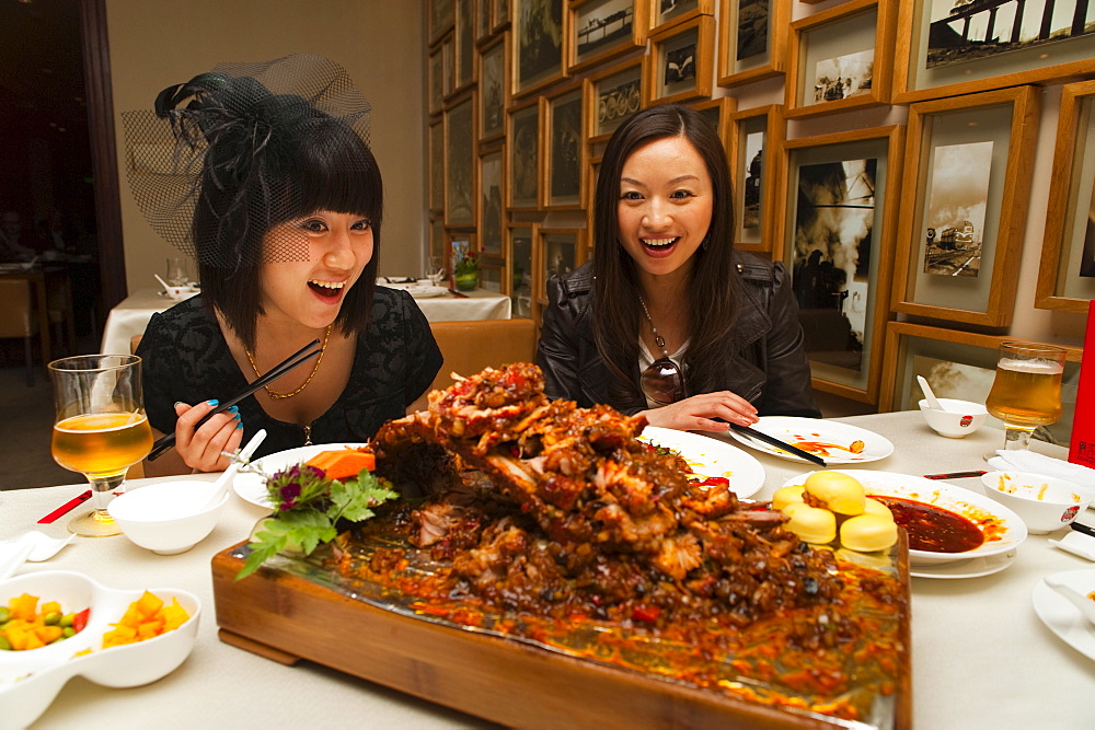 Tourists surprised by the food in a Sichuan cuisine restaurant, Haiyongxiang District, Shanghai, China, Asia