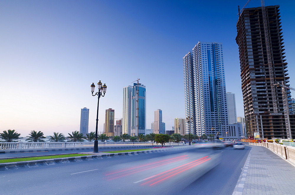 Al Khan Corniche and buildings beside Al Khan Lagoon, Al Qasba Area, Sharjah, United Arab Emirates, Middle East