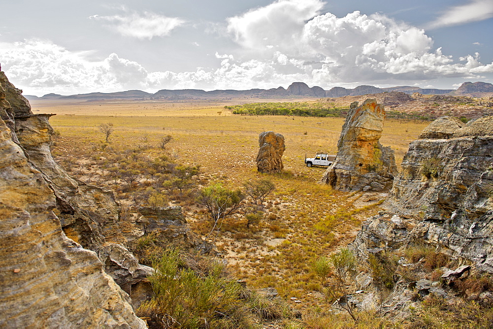 Land Rover parked on the plains of Isalo National Park, a region of the park on the Malaso circuit, southern Madagascar, Madagascar, Africa