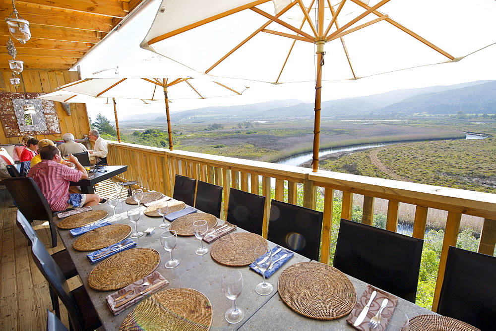 The restaurant and terrace of Emily Moon Lodge in Plettenberg Bay with the Bitou River in the background, Garden Route, Western Cape, South Africa, Africa