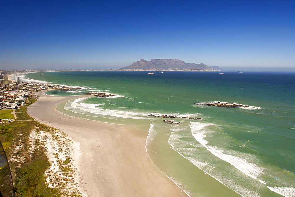 Aerial view south along the west coast north of Cape Town, with Big Bay, Blouberg and Table Mountain visible, South Africa, Africa