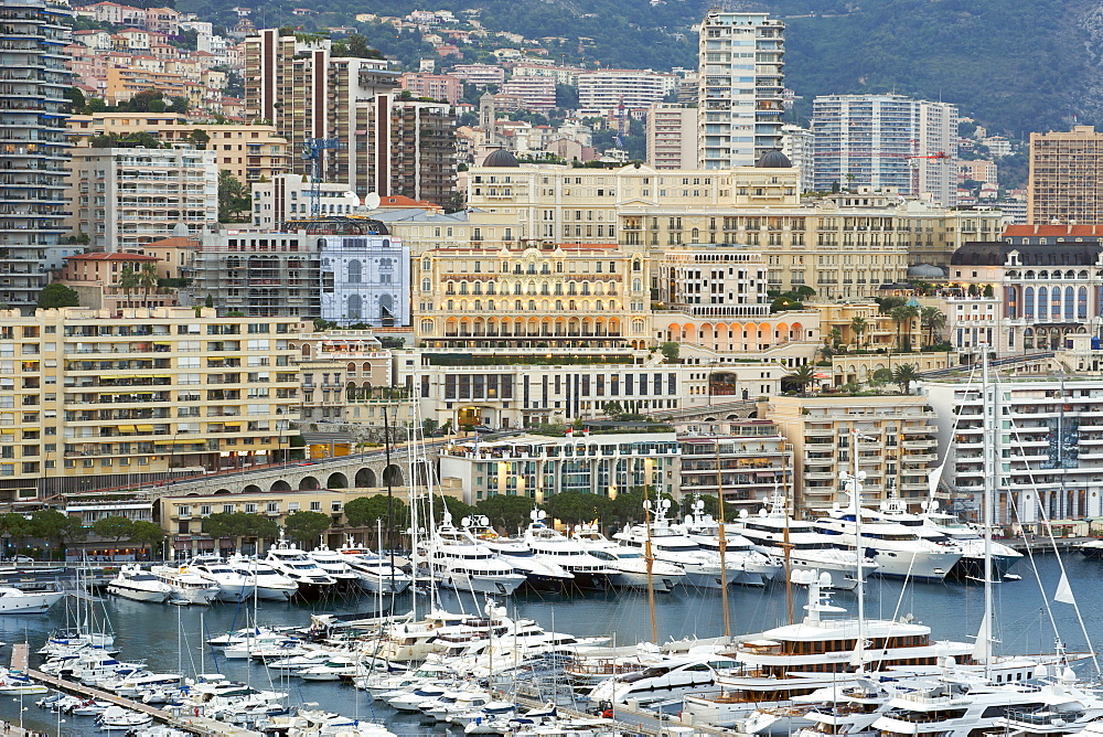 View of yachts and sailing boats in Port Hercule in the independant Principality of Monaco, Cote d'Azur, French Riviera, Mediterranean, Europe