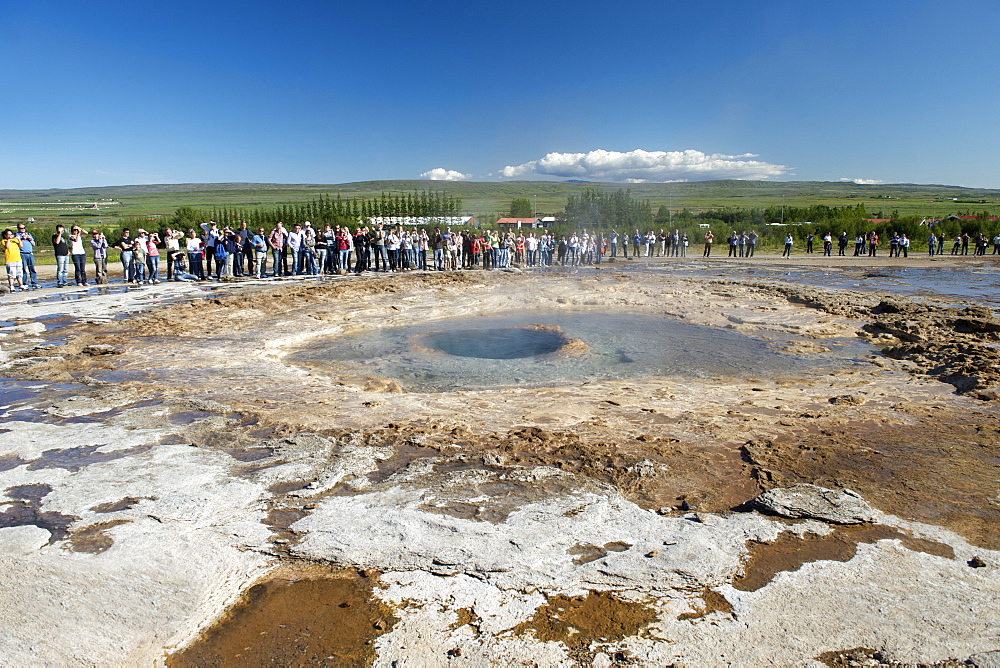 Tourists waiting for Strokkur geyser to erupt in Geysir, southwest region, Iceland, Polar Regions