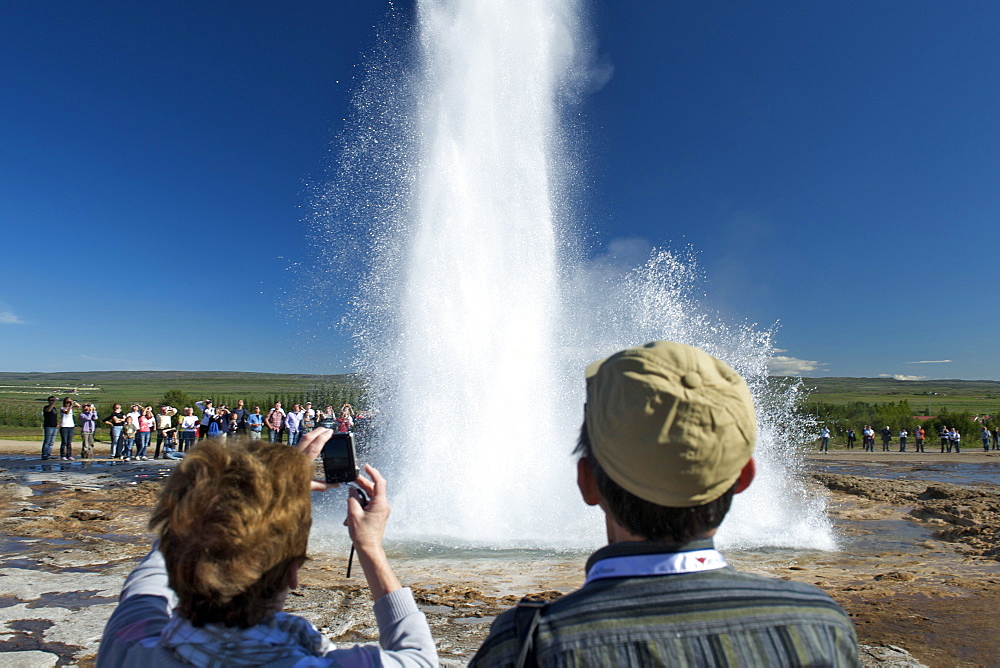 Strokkur geyser erupting in Geysir, southwest region, Iceland, Polar Regions