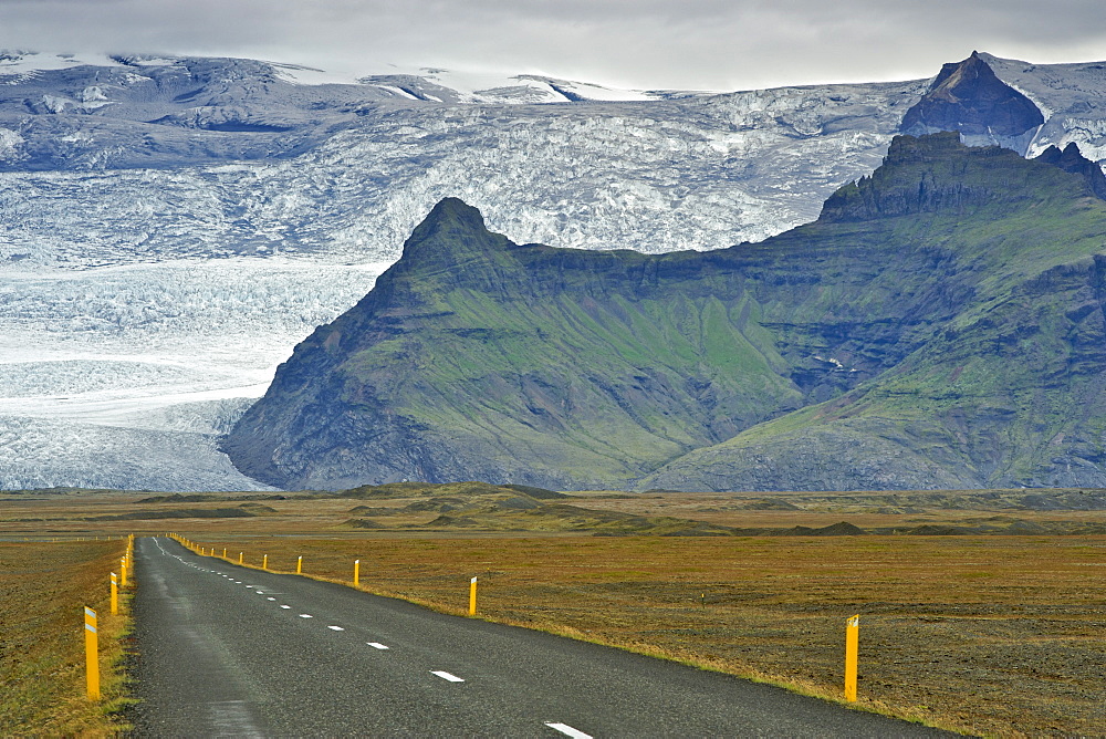 The ring road and slopes of Iceland's highest mountain Hvannadalshnukur, 2110m, part of Oraefajokull glacier, in the southeast, Iceland, Polar Regions