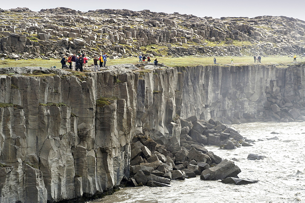 Tourists walking along the Jokulsa a Fjollum river bank between Selfoss and Dettifoss waterfalls near Myvatn, northeast area, Iceland, Polar Regions