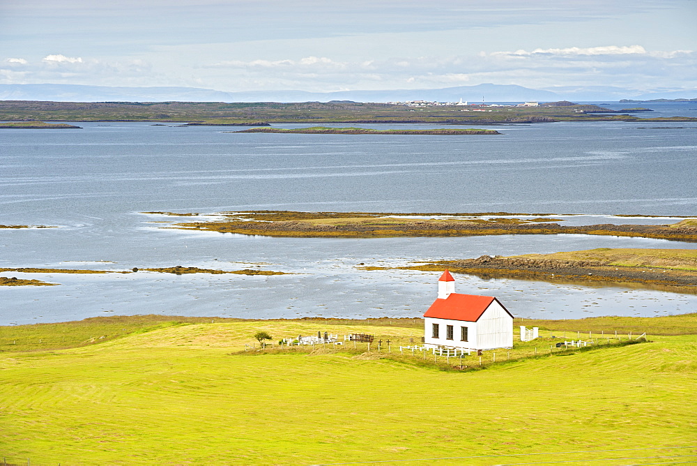 Flatey church and the coastal landscape of Breidafjordur fjord in the west, Iceland, Polar Regions