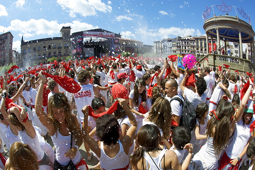 Crowds during the opening ceremony (chupinazo) of the festival of San Fermin (The Running of the Bulls), Pamplona, Navarra, Euskadi, Spain, Europe