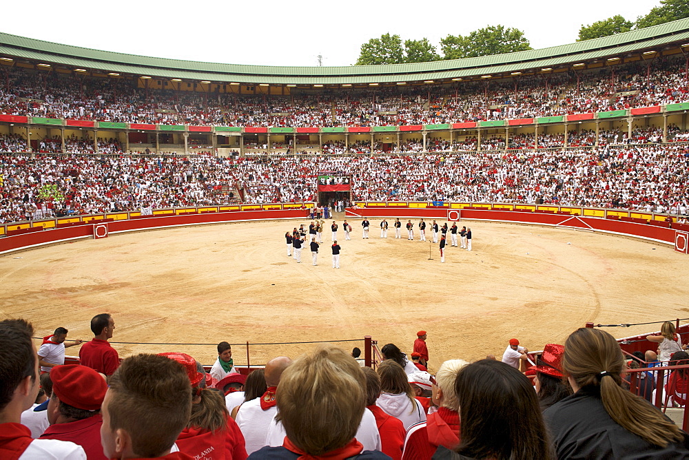 A band entertains the bullring crowds during the festival of San Fermin (The Running of the Bulls), Pamplona, Navarra, Euskadi, Spain, Europe