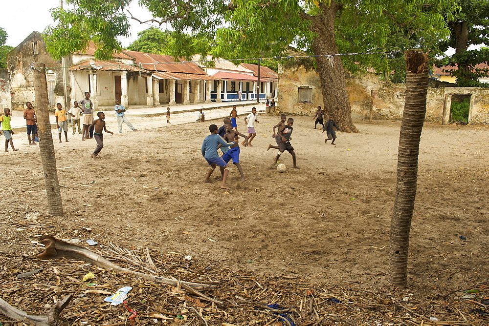 Kids playing soccer on Ibo island in the Quirimbas archipelago off the coast of northern Mozambique, Africa