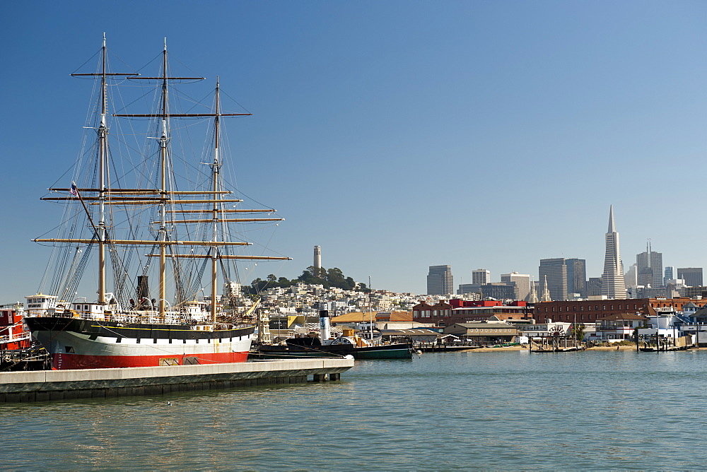 The San Francisco skyline and Fisherman's Wharf area seen across the lagoon of the San Francisco National Maritime Park, San Francisco, California, United States of America, North America