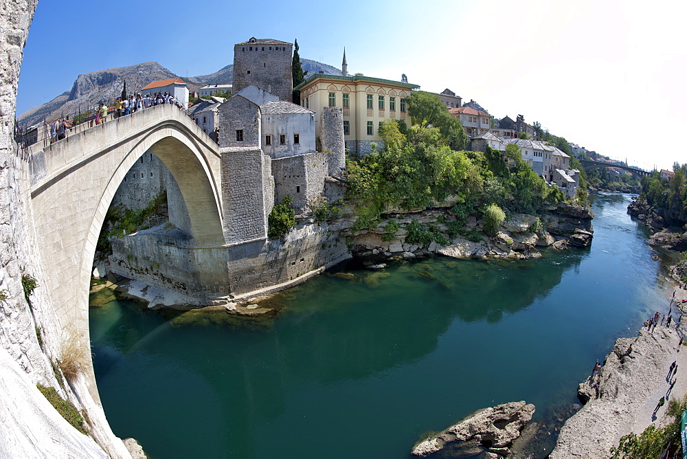 The Stari Most (Old Bridge) spanning the Neretva River in the Old City, UNESCO World Heritage Site, Mostar, Bosnia and Herzegovina, Europe