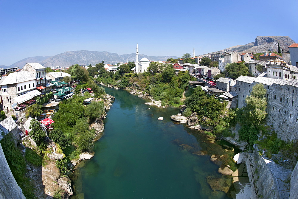 The town of Mostar and the Neretva River seen from the Stari Most (Old Bridge), Mostar, Bosnia and Herzegovina, Europe