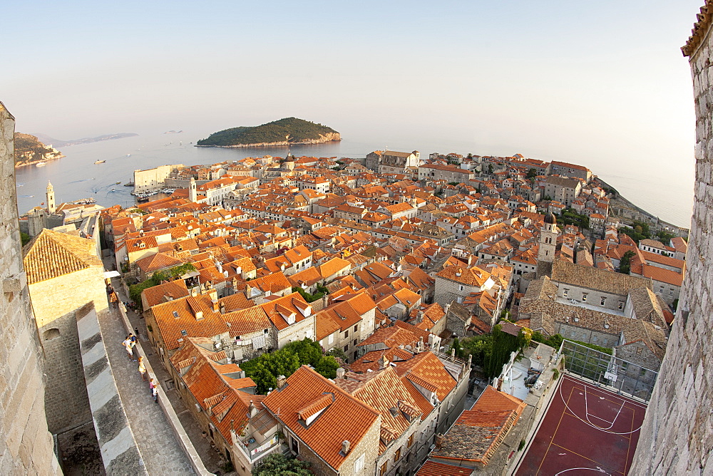 View from the Minceta Tower over the rooftops of the old town in the city of Dubrovnik, UNESCO World Heritage Site, with Lokrum Island beyond, Adriatic Coast, Croatia, Europe