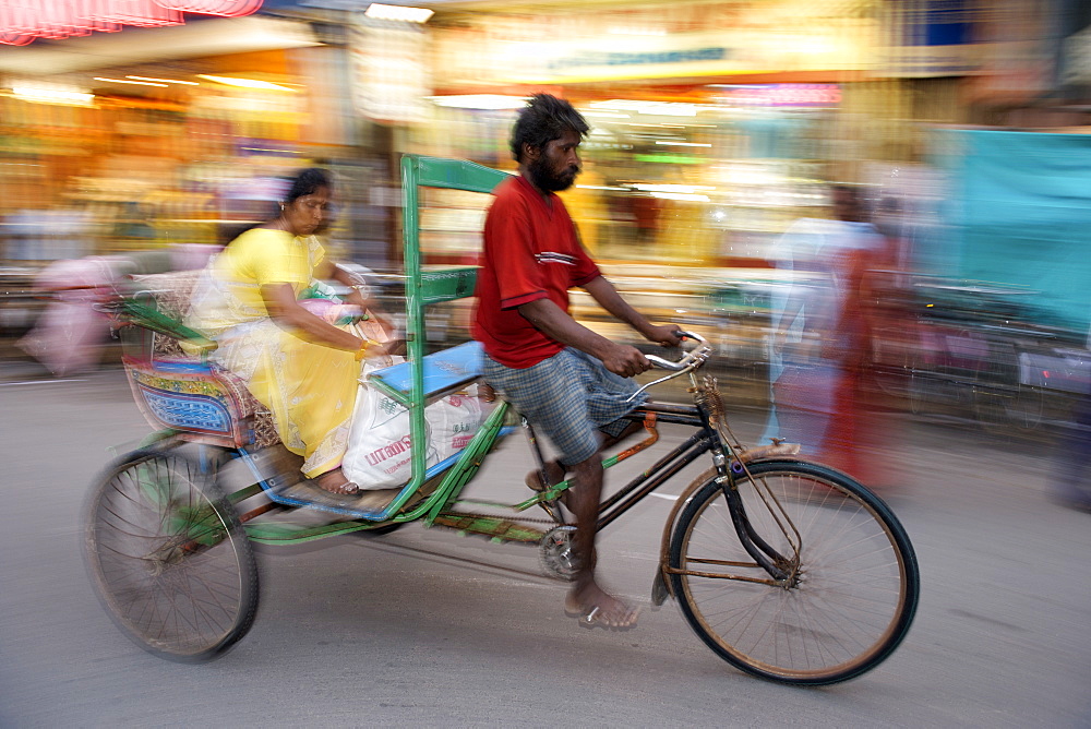 Bicycle transport on a Pondicherry street in India