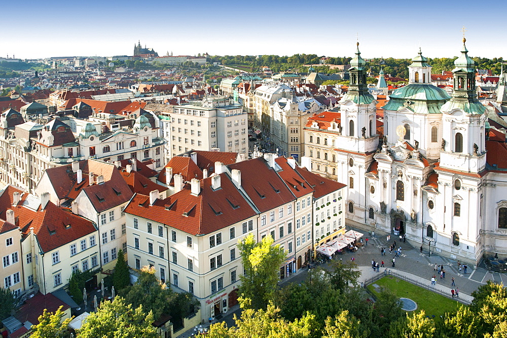 View of St. Nicholas' church and Old Town rooftops in Prague, Czech Republic, Europe