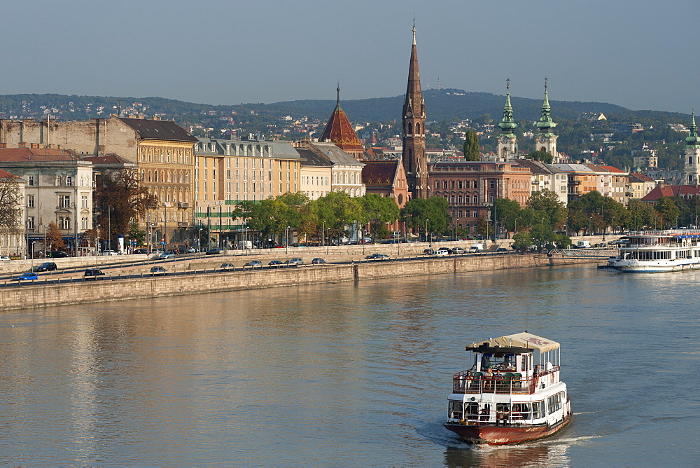 Dawn view of the Danube River in Budapest showing the Buda Reformed Church in the centre and St. Anne's Church on the right, Budapest, Hungary, Europe