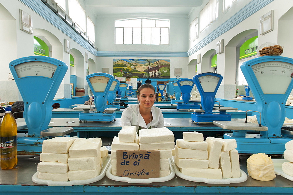 Moldovan woman selling cheese in the dairy market in Chisinau, the capital of Moldova, Europe