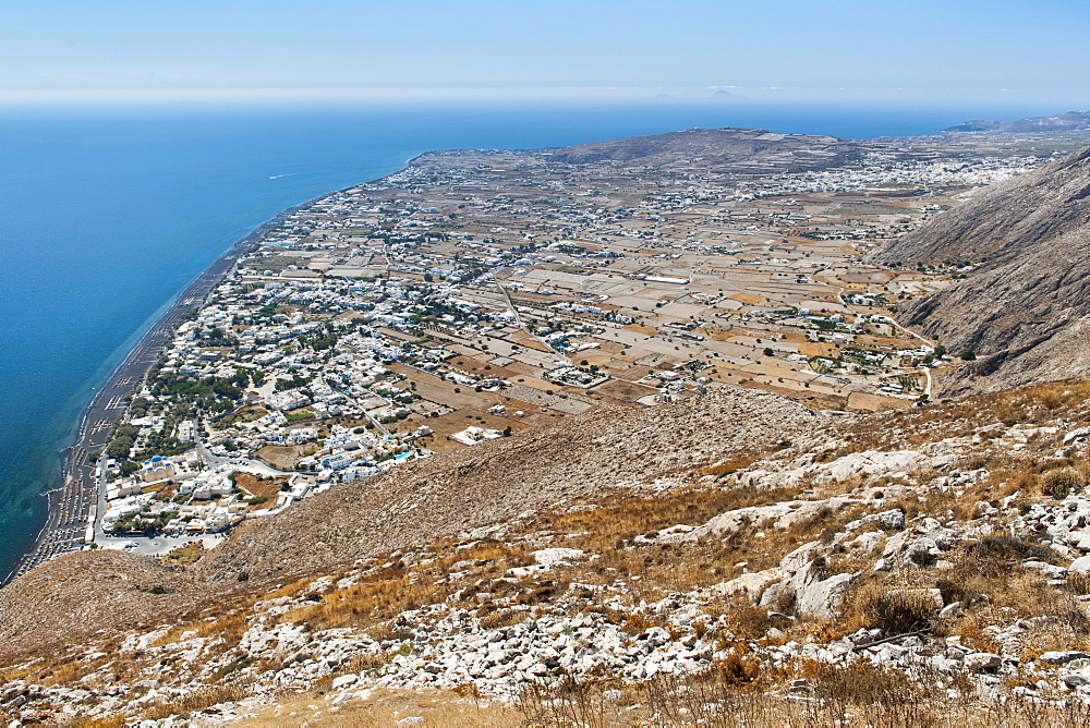 View from Messavouno mountain onto the beach and village of Perissa and the area of Perivolos on the Greek island of Santorini, Cyclades, Greek Islands, Greece, Europe