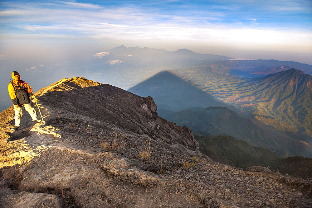 Balinese guide on the path leading to the summit of Gunung Agung (3142m), the highest volcano on the island of Bali, Indonesia.