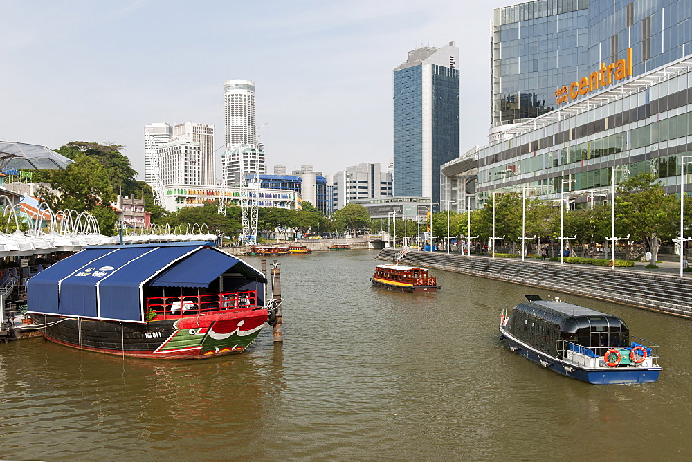 Boats on the Singapore river at Clarke Quay in Singapore.