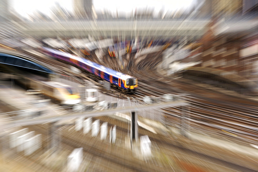 Zoom view of trains leaving London's Waterloo train station.