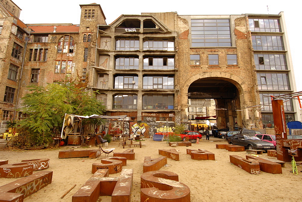 Rear facade of the Kunsthaus Tacheles building, a former department store bombed during World War II, now housing a gallery and small theatre, Mitte District, East Berlin, Germany, Europe