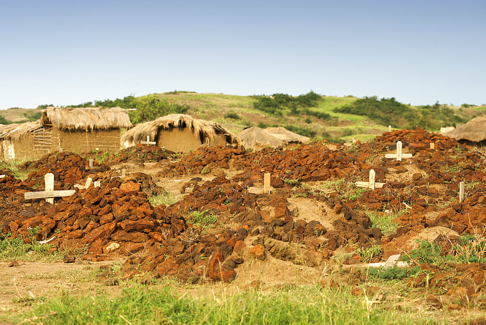 Cemetery and crosses in a village in Kabwoya wildlife reserve on the shores of Lake Albert in Uganda.