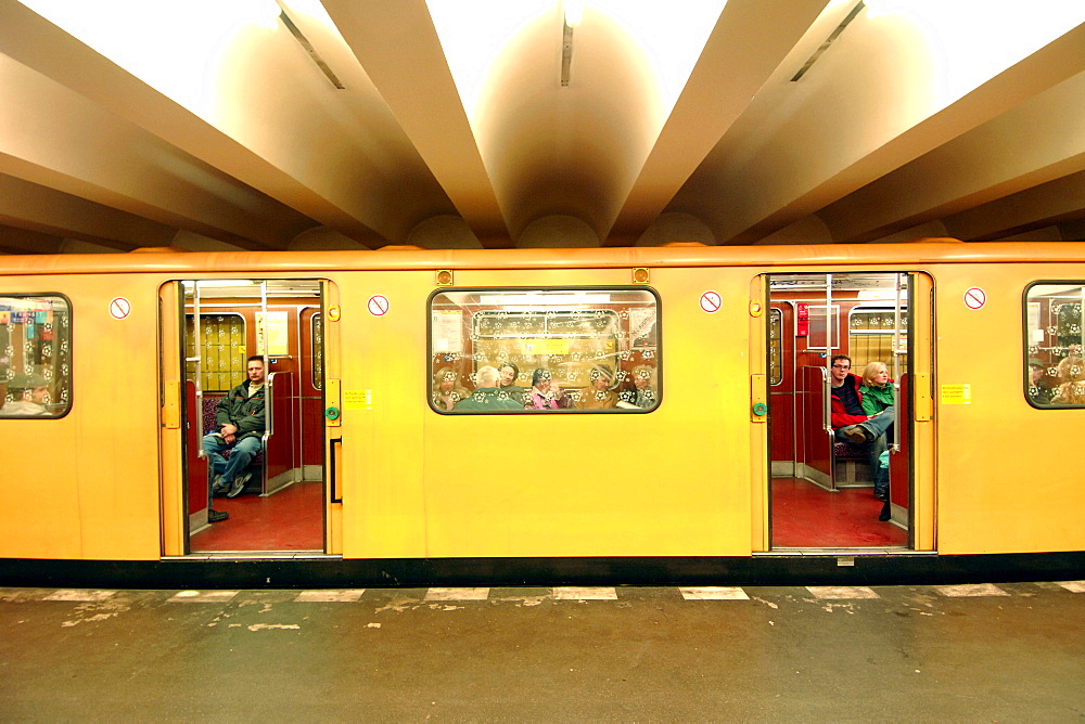 A train at the Rosa-Luxemburg-Platz U-Bahn station in East Berlin, Germany, Europe