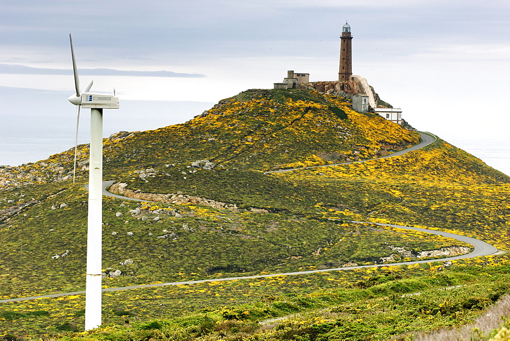 Camarin~as lighthouse and a wind turbine at Cabo Vilan on the Atlantic coast of Spain's Galicia region.