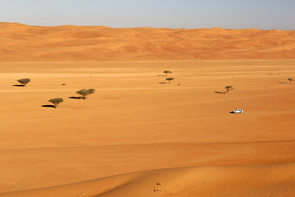 4X4 driving through Wahiba Sands (Ramlat al Wahaybah) in Oman.