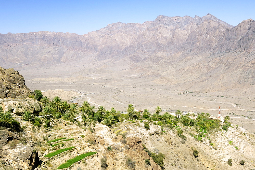 The village of Wekan and its plantations situated high in the Ghubrah bowl region of the Jebel Akhdar mountains in Oman.