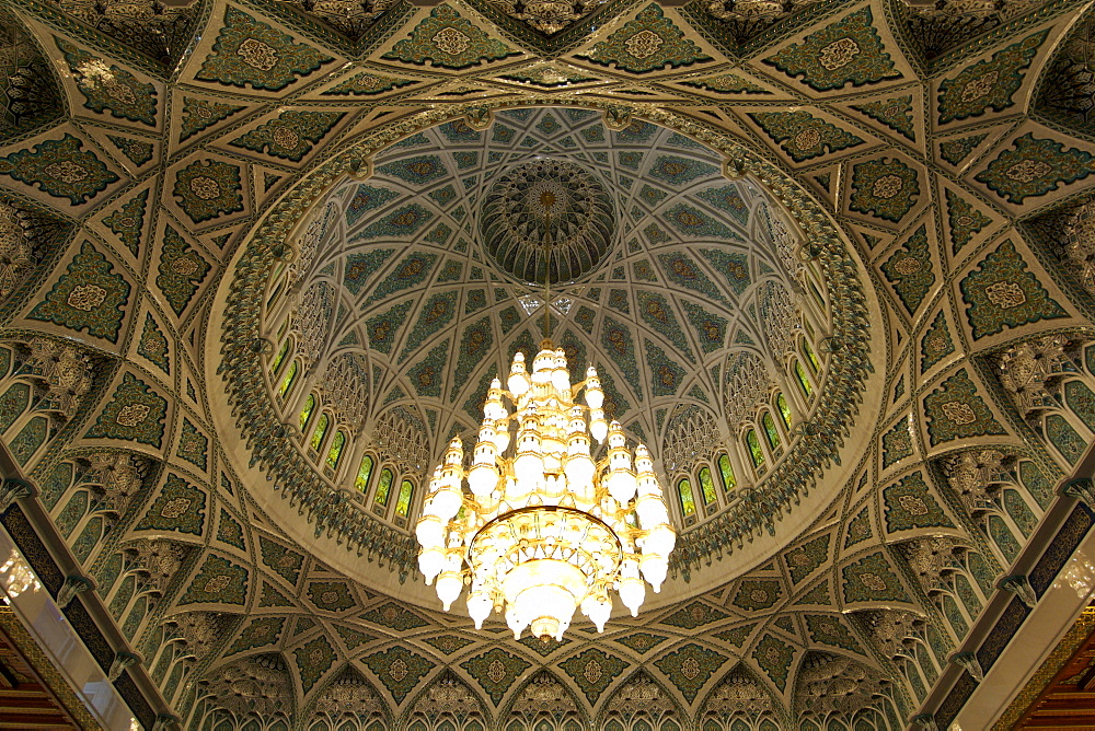 Chandelier and roof inside the prayer area of the Sultan Qaboos Grand Mosque in Muscat, the capital of Oman.