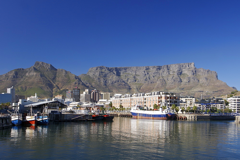 View of Table Mountain, Devil's Peak and the waterfront in Cape Town South Africa.