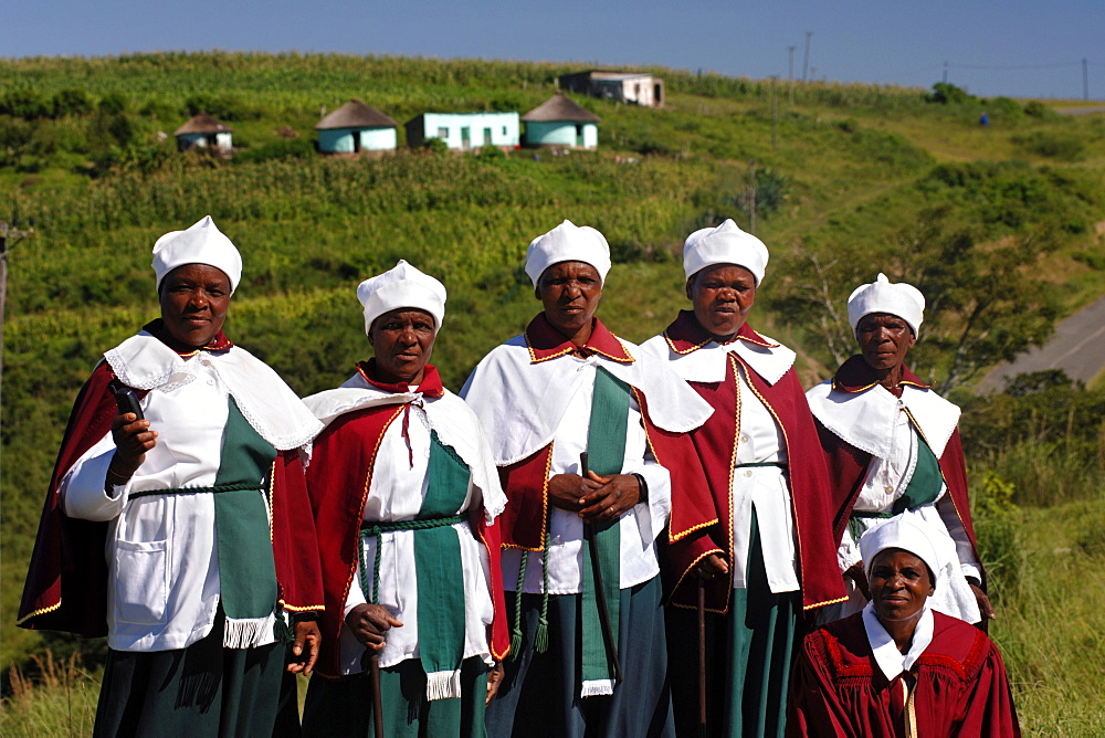 A group of Xhosa women pose for a photo in the Eastern Cape Province of South Africa. This is an area along the Coffee Bay road in a region formerly known as the Transkei,