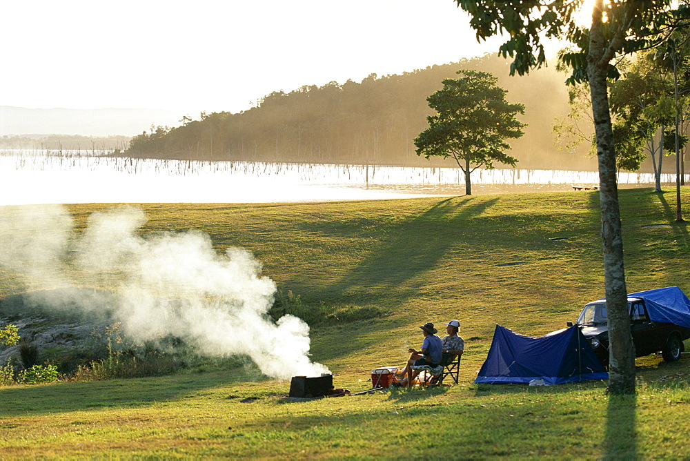 Campers by Lake Tinaroo, a recreation area in the Barron River hydro system on the Atherton Tableland, south west of Cairns, Queensland, Australia, Pacific