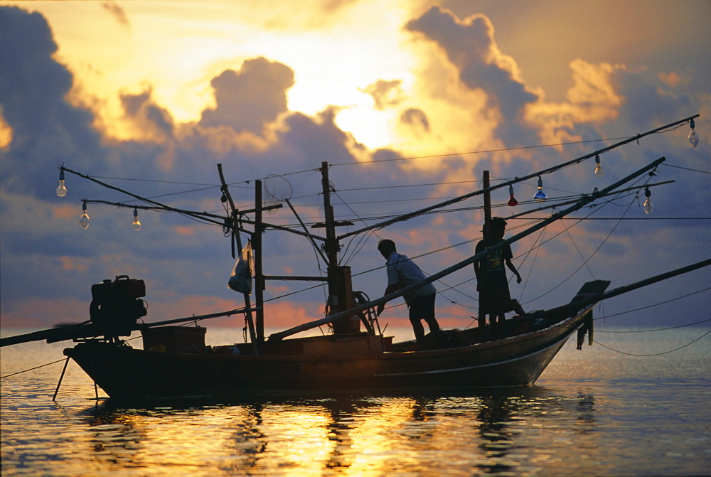 Fishing boat at sunrise at Haad Rin Beach, Koh Pha Ngan, Thailand