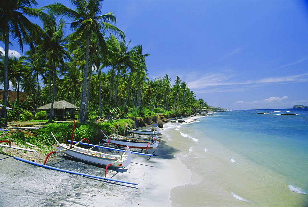 The beach at Candidasa, popular east coast resort which has lost a lot of sand to erosion, Bali, Indonesia, Asia