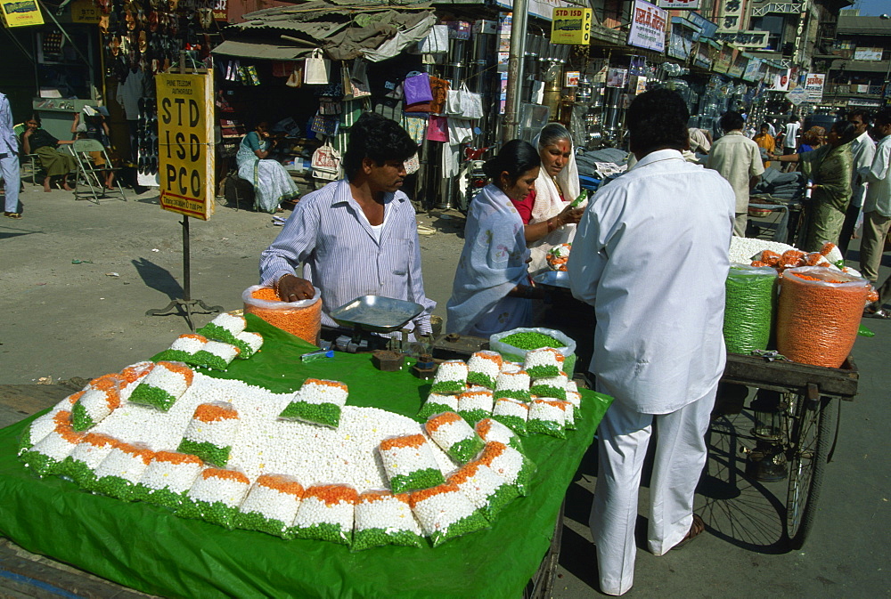 Snacks for sale in the colours of the Indian national flag for Republic Day, Pune, Maharashtra state, India, Asia