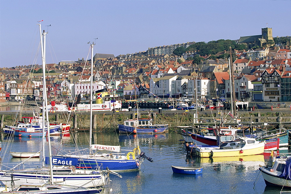 Boats in harbour and seafront, Scarborough, Yorkshire, England, United Kingdom, Europe